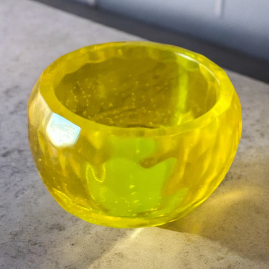 Small 1 inch high by 1 1/2 inch wide Yellow bowl.