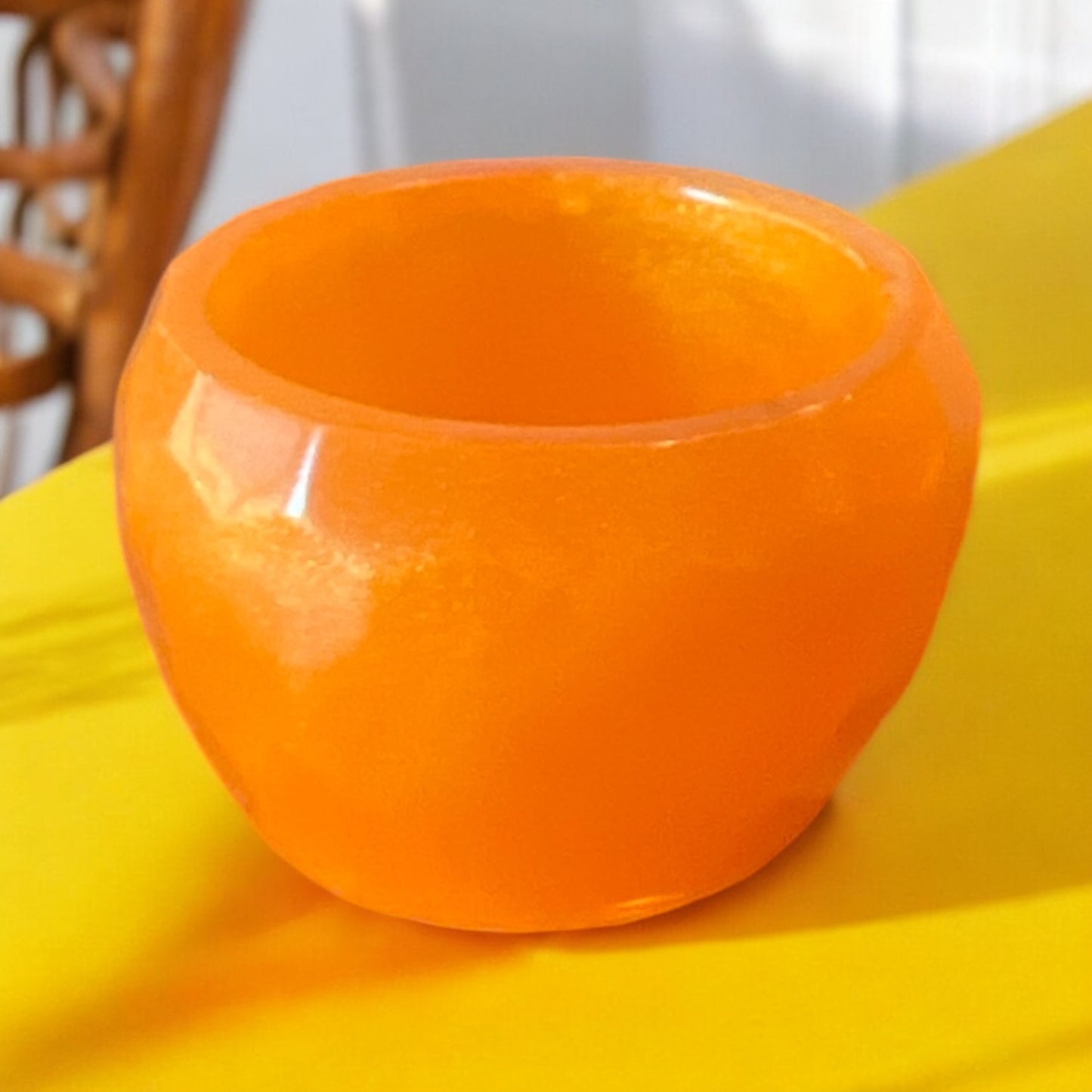 Orange bowl Small 1 in high by 1 1/2 in wide  bowl.